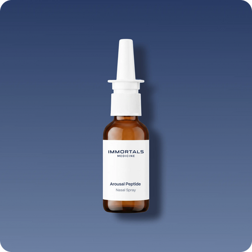 Immortals Medicine Arousal Peptide nasal spray in an amber glass bottle on a blue background, libido and sexual wellness peptide treatment