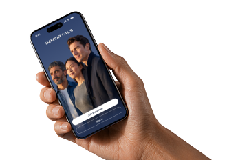 Hand holding a smartphone displaying an app interface with a family photo.