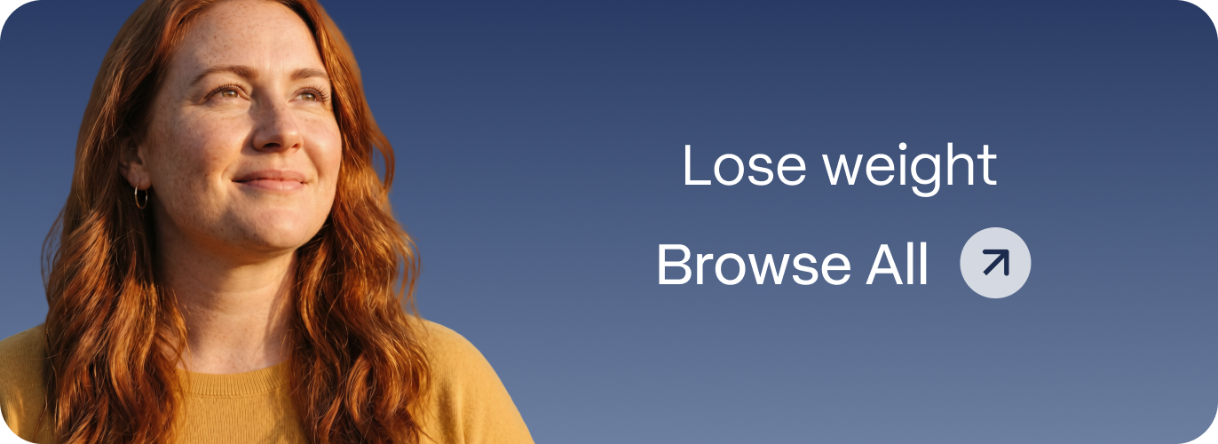 Smiling woman with long red hair in a yellow sweater against a blue sky, representing Blueprint Immortals weight loss treatments