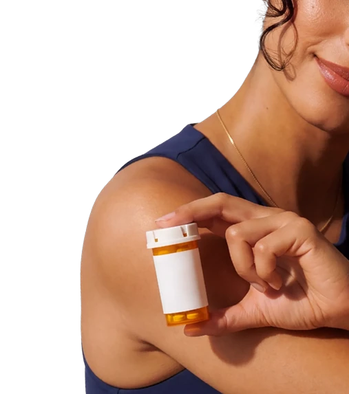 Woman holding an Immortals Medicine prescription bottle