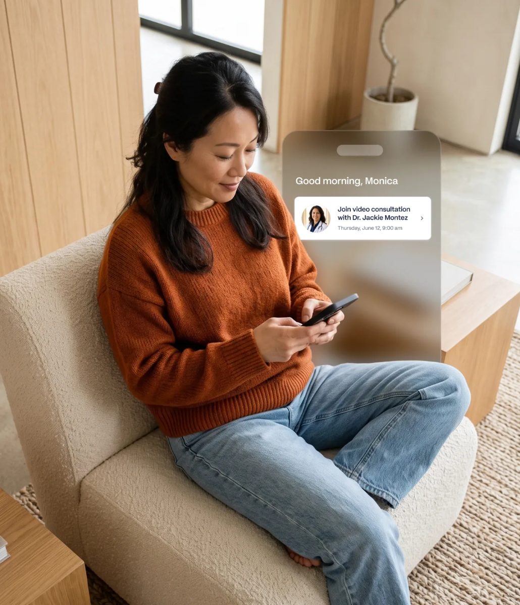 Woman on her phone with a notification to join a video consultation with her doctor